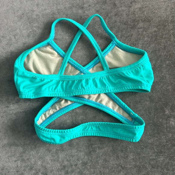 2nd Skin Cali Top. Crisscross front. wrap around torso. Color- green. Size- S - Picture 2 of 5